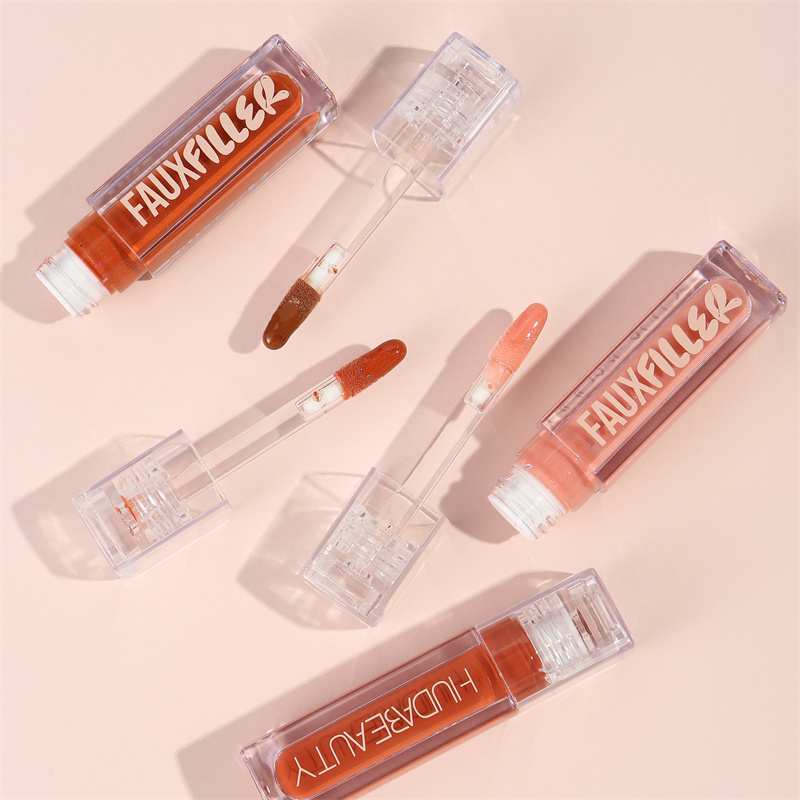 Huda Beauty Faux Filler Lip Gl - Huda Beauty Makeup Bag ulasan dan harga